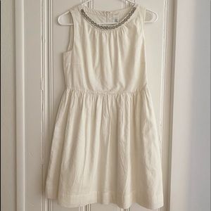 white dress with embellishments